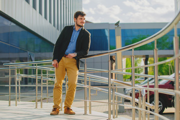 Young businessman looks to the future with confidence.