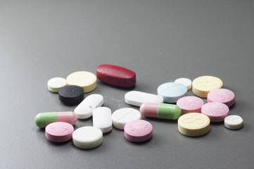 Obraz na płótnie Canvas Assortment of pills - Medicine Concept