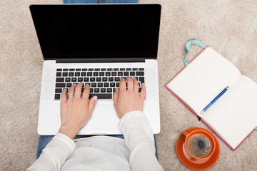 Fototapeta premium Typing on laptop keyboard