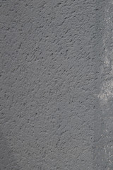 Grey bumpy concrete wall texture for designer