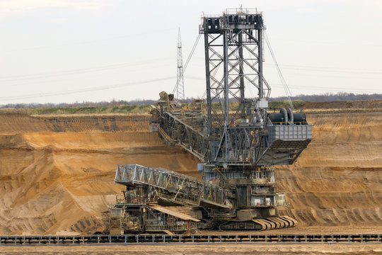 Mining excavator in a brown coal open pot mine