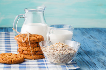 Minimal healthy breakfast with oat and milk glass