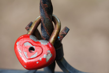 Aged padlock. Love heart shape design, red paint metal texture, pattern and vintage design. romance...