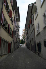 Fototapeta na wymiar Narrow street / Little street in the old quarter of Zurich