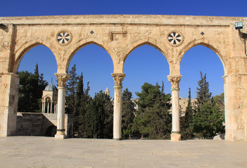 Fototapeta na wymiar Arched colonnade along the square on the Temple Mount in Jerusalem, Israel.