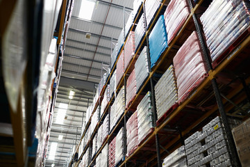 Low angle view of stock stored in a distribution warehouse