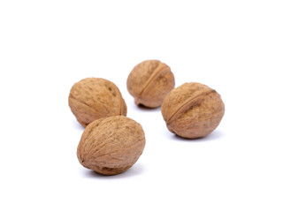 Walnuts in shell isolated on white background