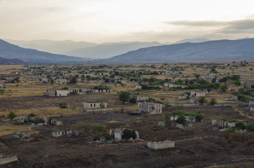 Fototapeta na wymiar Ruins of Agdam city in Nagorno Karabakh Republic. Azerbaijan - Armenia war result
