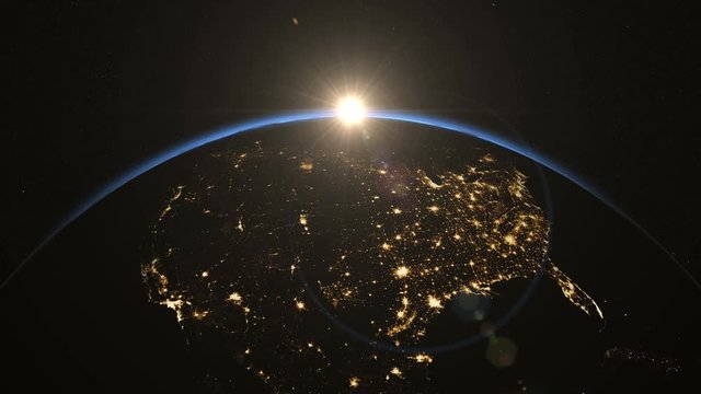 Sunrise over USA. The United States from space. Clip contains earth, usa, us, sunrise, space, night, light, city, map, United States. Images from NASA.	