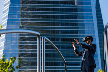 Businessman using virtual reality glasses