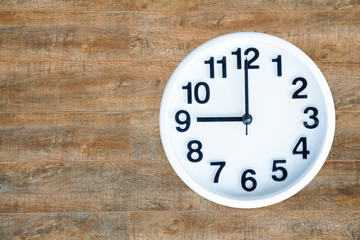 Clock on wood background