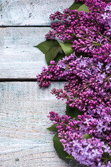 Lilac flowers. Bouquet of lilacs on a wooden background. selective focus