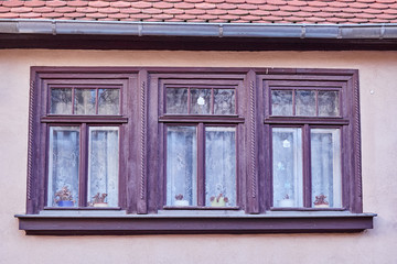 Fototapeta premium triple windows of an old vintage home