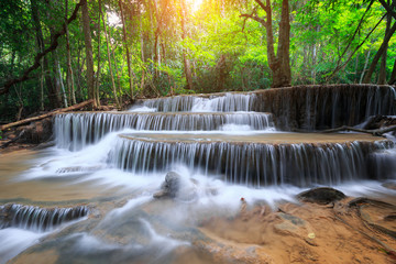 Fototapeta na wymiar Huay Mae Kamin Waterfall, beautiful waterfall in rainforest, Kanchanaburi province, Thailand