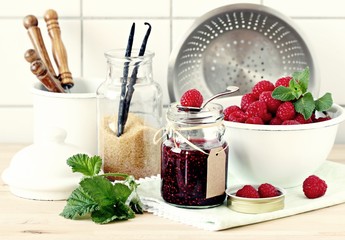Homemade raspberry jam and fresh raspberry . Rustic style.Selective focus 