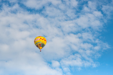 Hot air balloon over blue sky