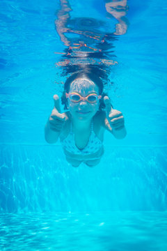 Underwater portrait of child