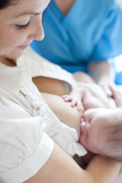 Newborn baby breastfeeding