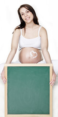 Pregnant woman with whiteboard