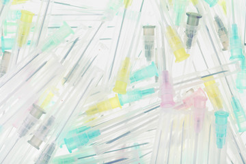 Obraz premium Heap of syringe needles on the white background