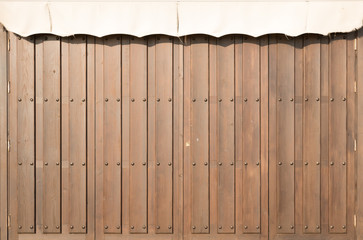 Wooden door. Door Store closed.