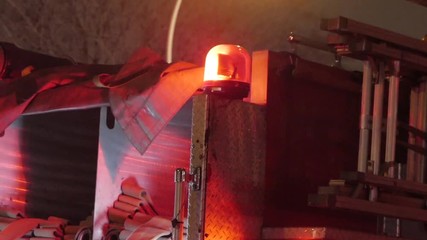 Fire Truck with emergency lights turned on nightime.