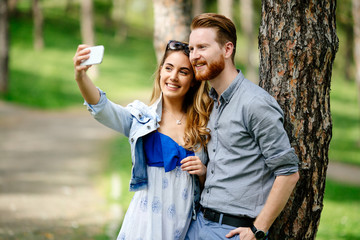 Couple taking selfie in nature