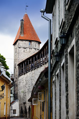 Street and tower of a city wall. Old city. Tallinn, Estonia