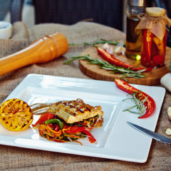 Baked perch fillet with rosemary and lemon with blanched vegetables