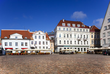 Obraz premium Old city, Tallinn, Estonia. Bright multicolor houses on the Town hall square...