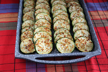 Served fresh baked spicy zucchini, sliced, marinated in olive oi