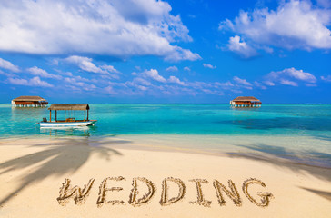 Word Wedding on beach