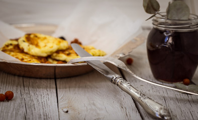 luscious cheesecakes on a metal tray with wooden background