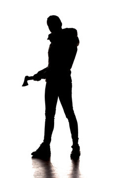 silhouette of a woman with an ax on a white background