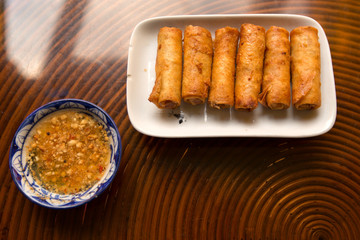 Fried spring rolls with peanut sauce