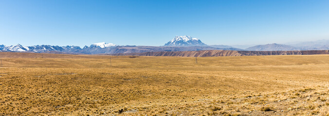 Fototapeta na wymiar Mountains road Chacaltaya Huayna Potosi summit snow peaks panorama.