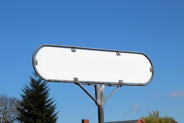 empty old white sign on blue sky background