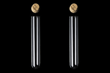 Two glass transparent test tubes with cork above on black background