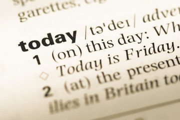 Obraz premium Close up of old English dictionary page with word today