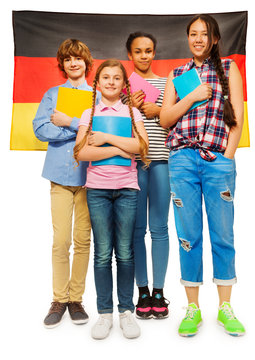 Whole-length picture of kids against German flag