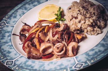 Delicious calamari rings with rice