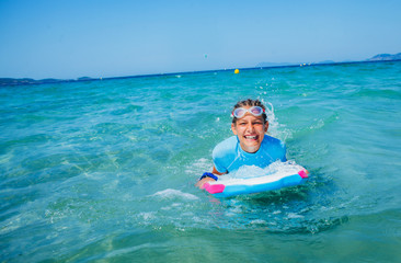 Young surfer girl