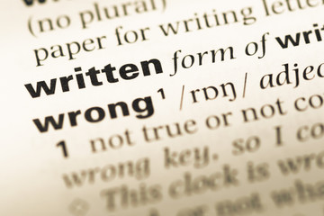 Fototapeta premium Close up of old English dictionary page with word written