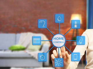 Using smart home app on virtual screen. Smart home control concept.