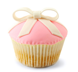 Tasty cupcake with bow, isolated on white
