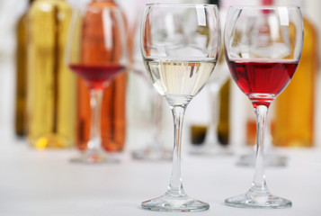 Wine glasses with red and white wine, closeup