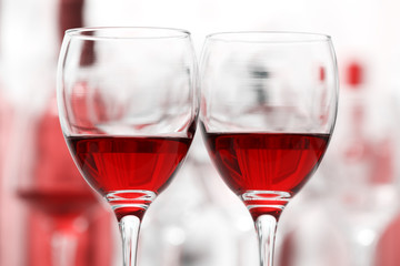 Wine glasses with red and white wine, closeup