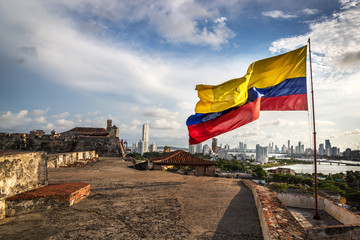 Cartagena, Colombia - August 2nd 2013 - The Colombian flag in the Cartagena Fort in a cloudy and...