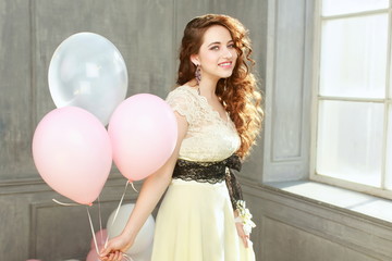 Happy teen girl in prom look with helium air balloons © Embrace of Beauty