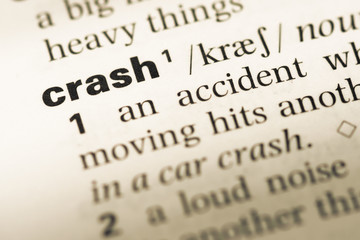 Obraz premium Close up of old English dictionary page with word crash